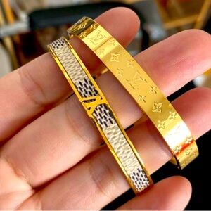 Non tarnish LV bangles,
